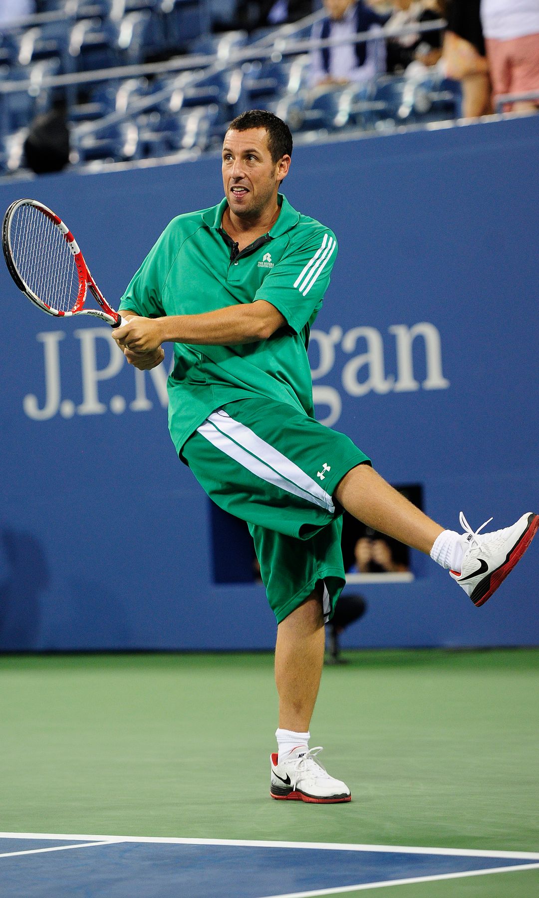 Adam Sandler playing at the 2012 US Open