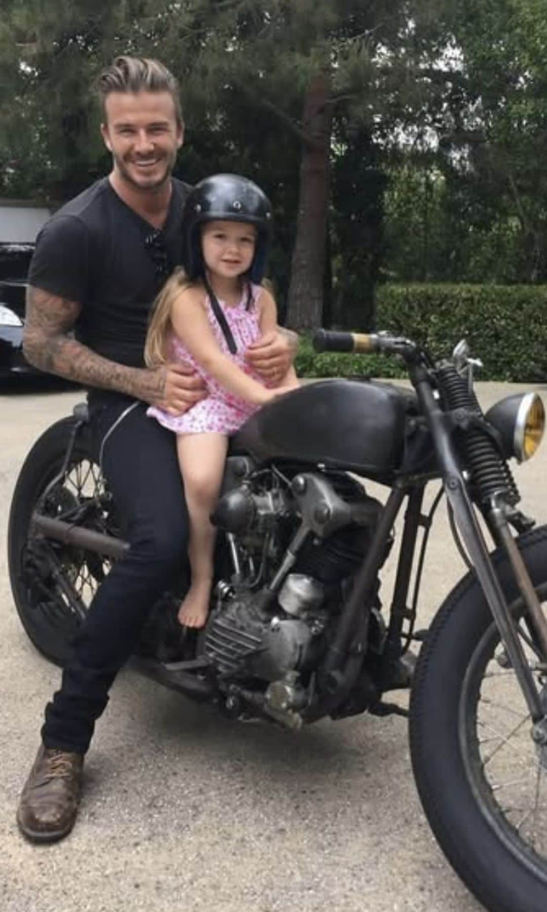 David and Harper riding a motorcycle together