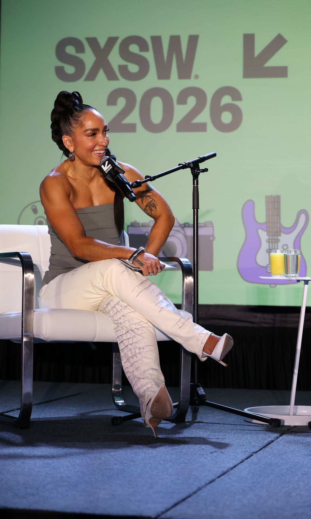 Robin Arzón speaks on the Project Swagger podcast featuring Mark Cuban at the Vox Media Podcast Stage at SXSW 2026 in Austin, Texas