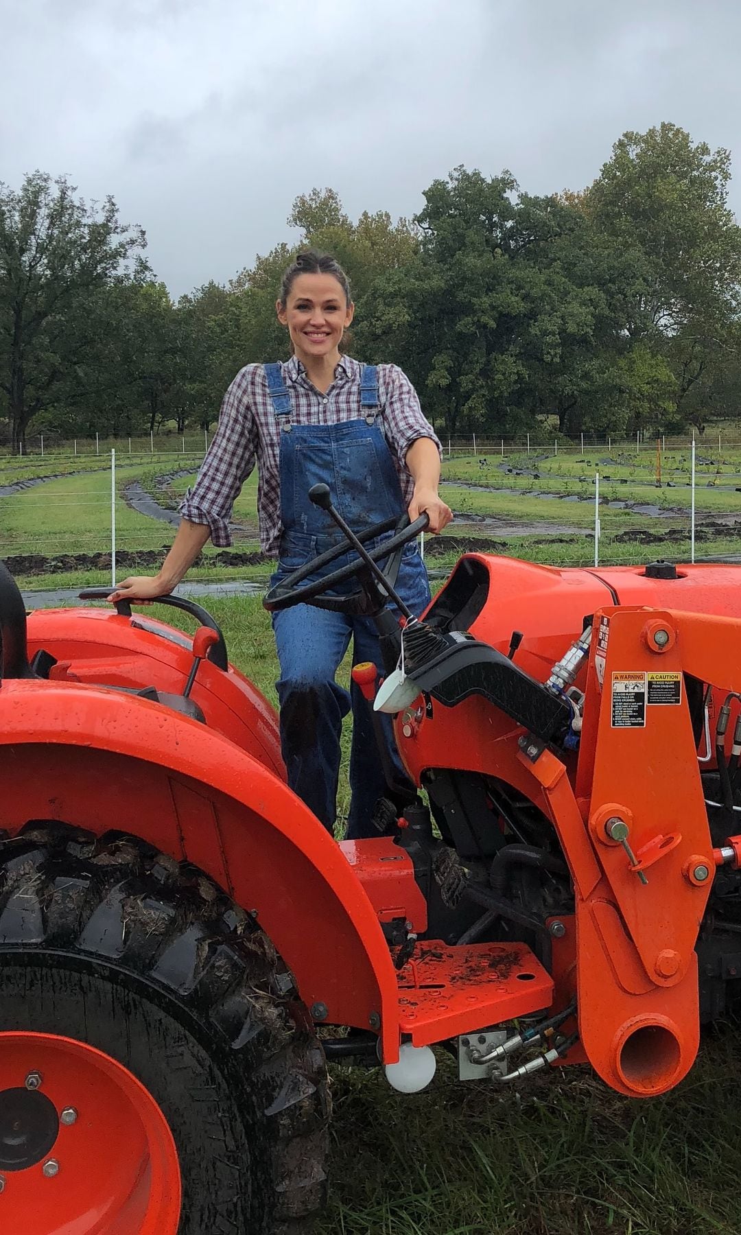 Garner shared some photos of herself atop different tractors
