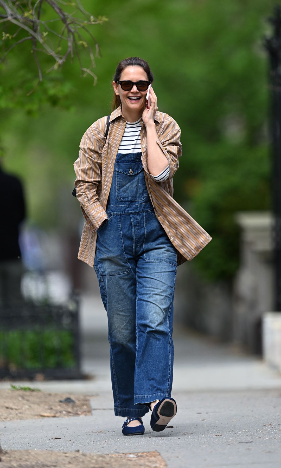 Katie Holmes in denim overalls and Mary Janes