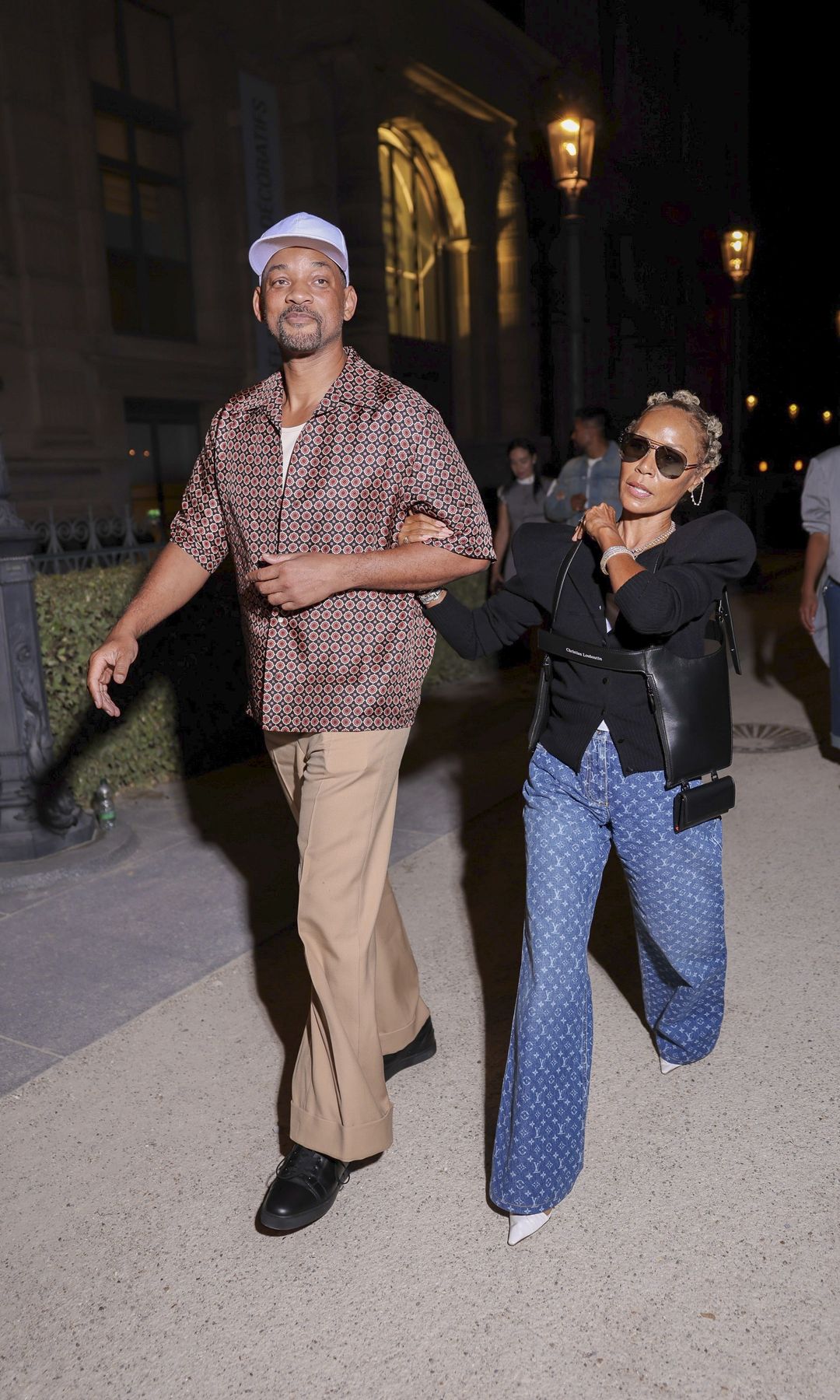 Will and Jada were spotted looking stylish together, holding out to each other's arms
