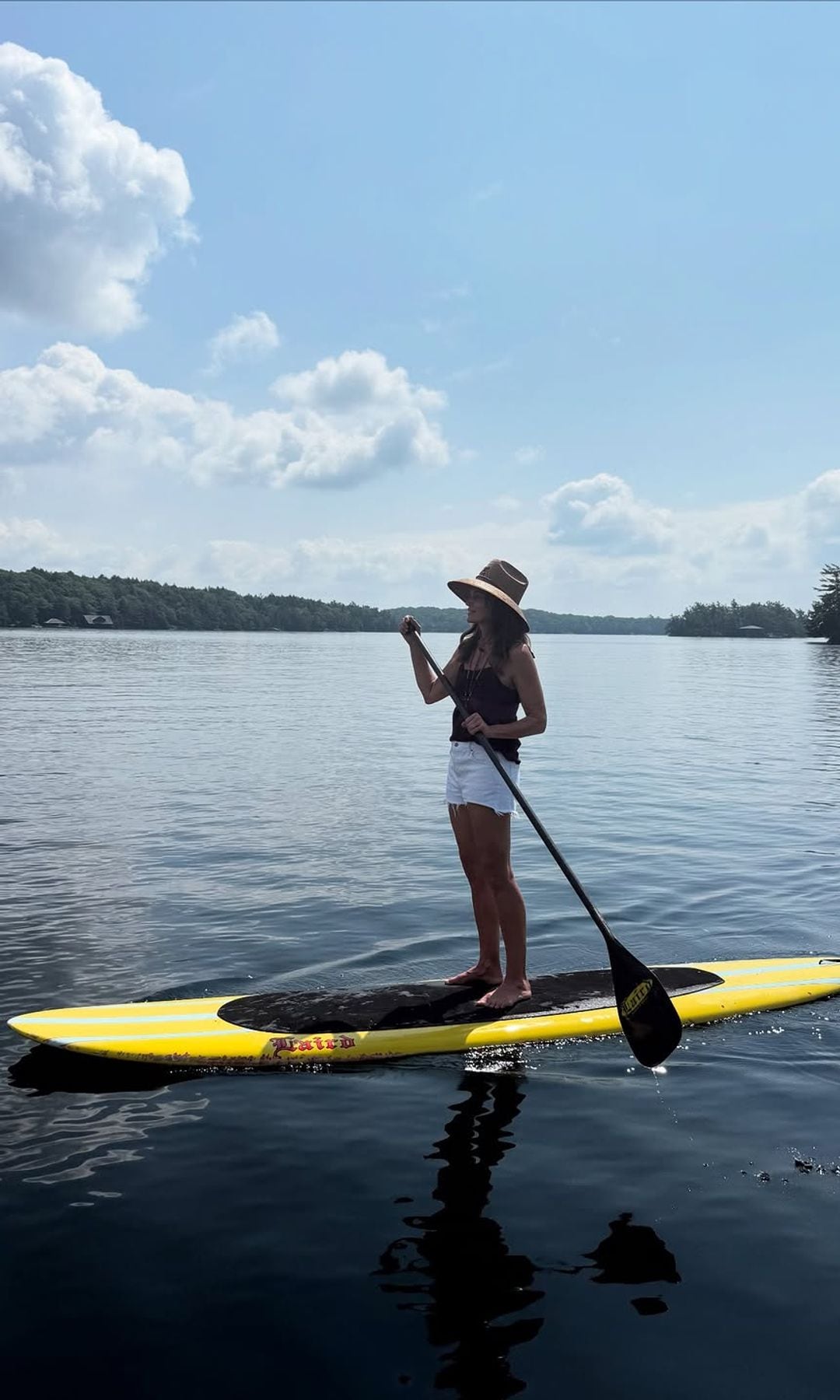 Cindy Crawford paddle boarding