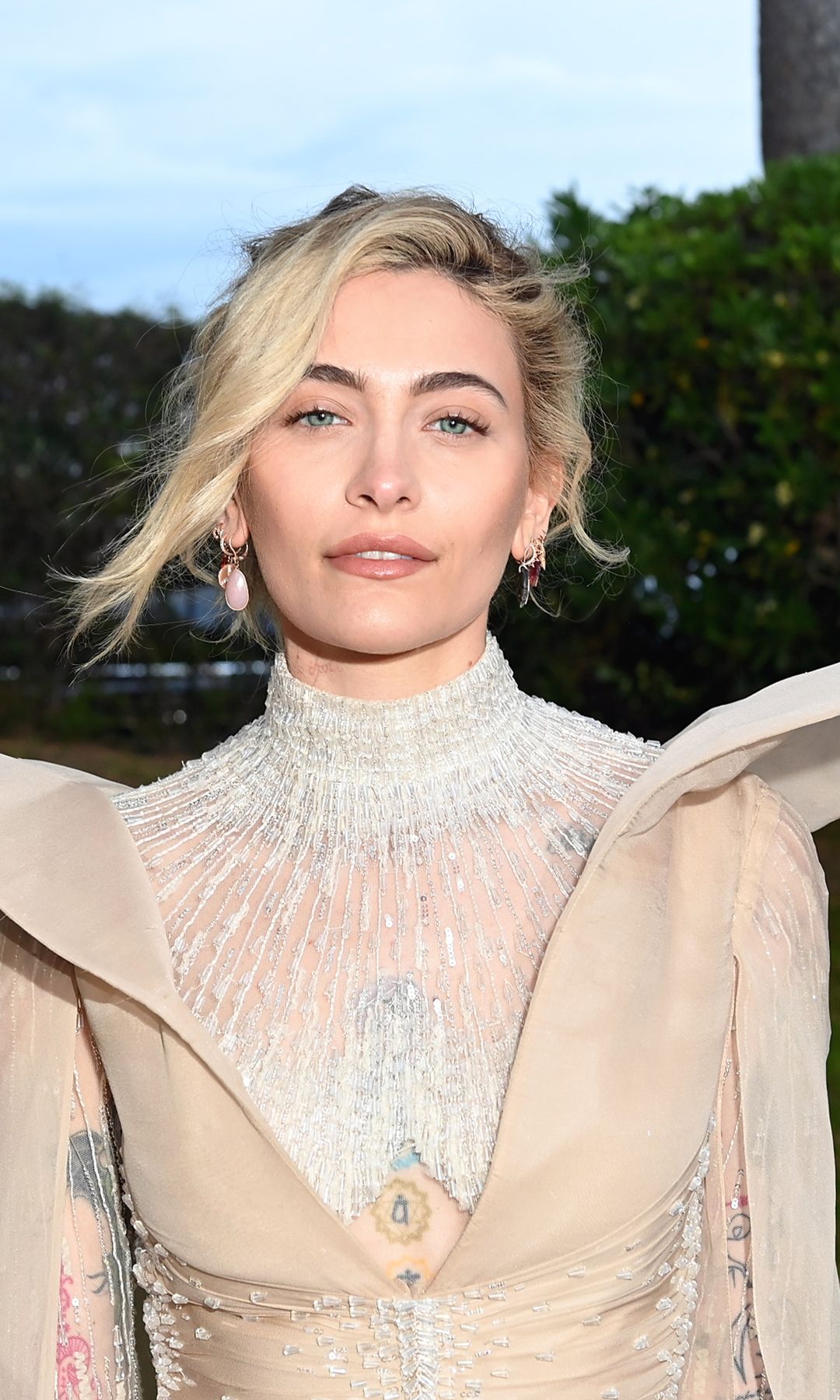 Paris Jackson poses in dramatic sheer gown at the amfAR Gala in Cannes