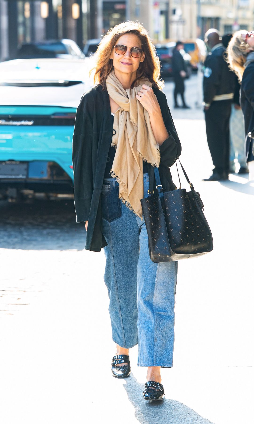 Katie Holmes with the perfect fall outfit that includes a pair of Mary Janes. 