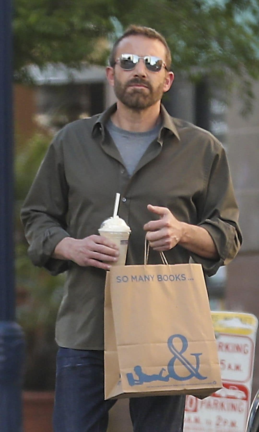 Affleck was spotted carrying some books and a milkshake
