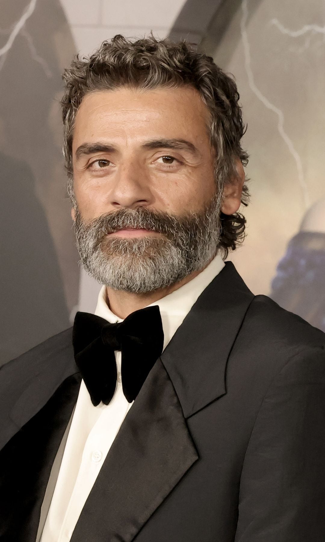 Oscar Isaac turns heads in oversized tux trend and a surprisingly refined mini-mullet