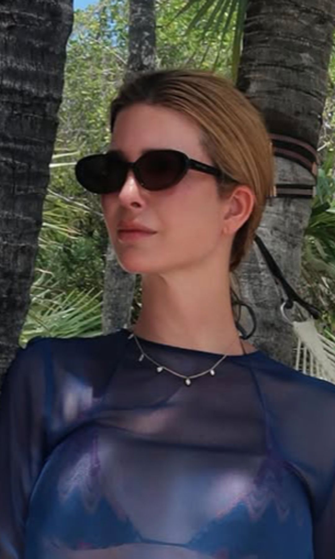 Ivanka Trump turns heads in strapless red dress and daring sheer beach look in new beachside photos
