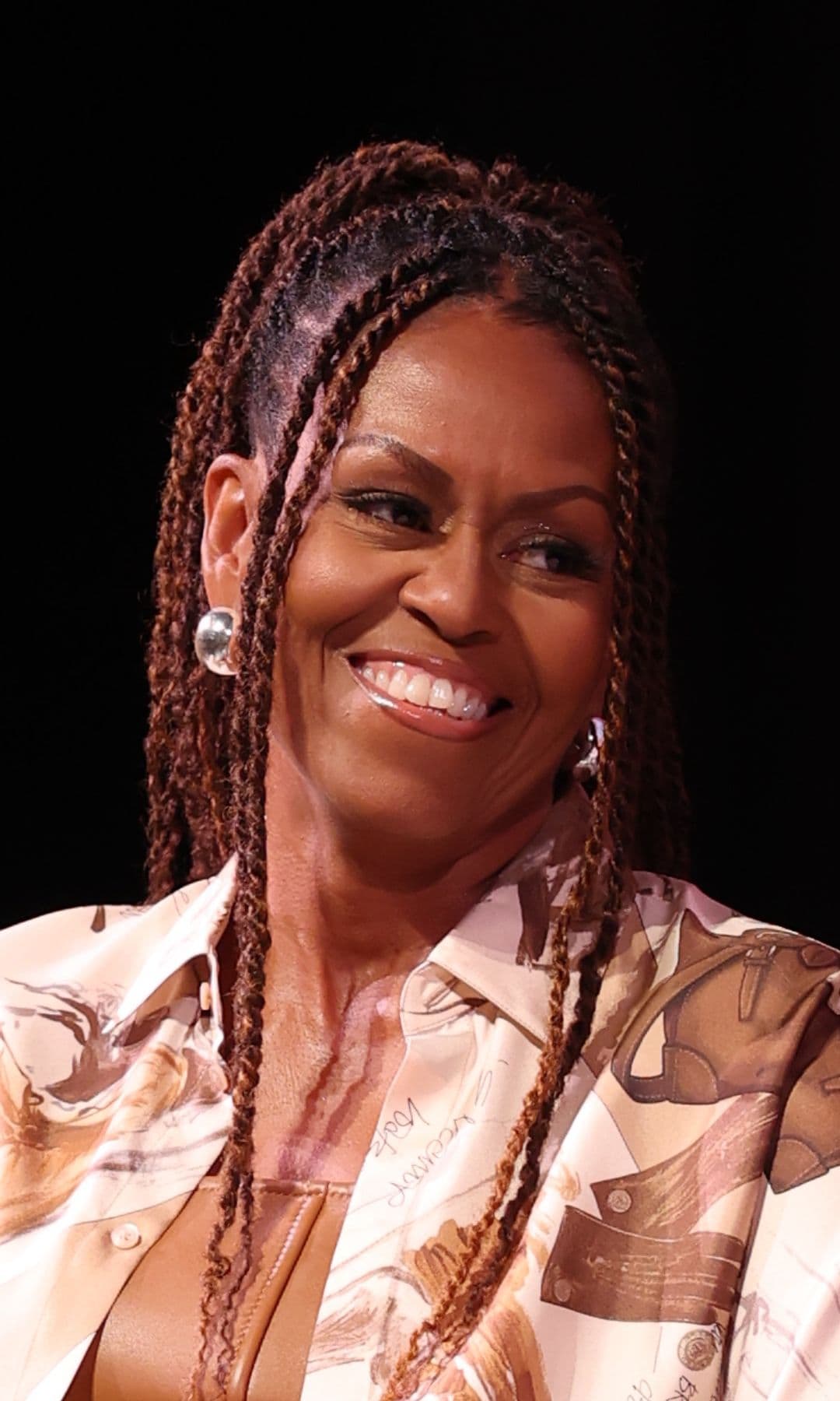 Michelle Obama’s latest semi-sheer look and statement jewelry: Inside her hair and makeup evolution