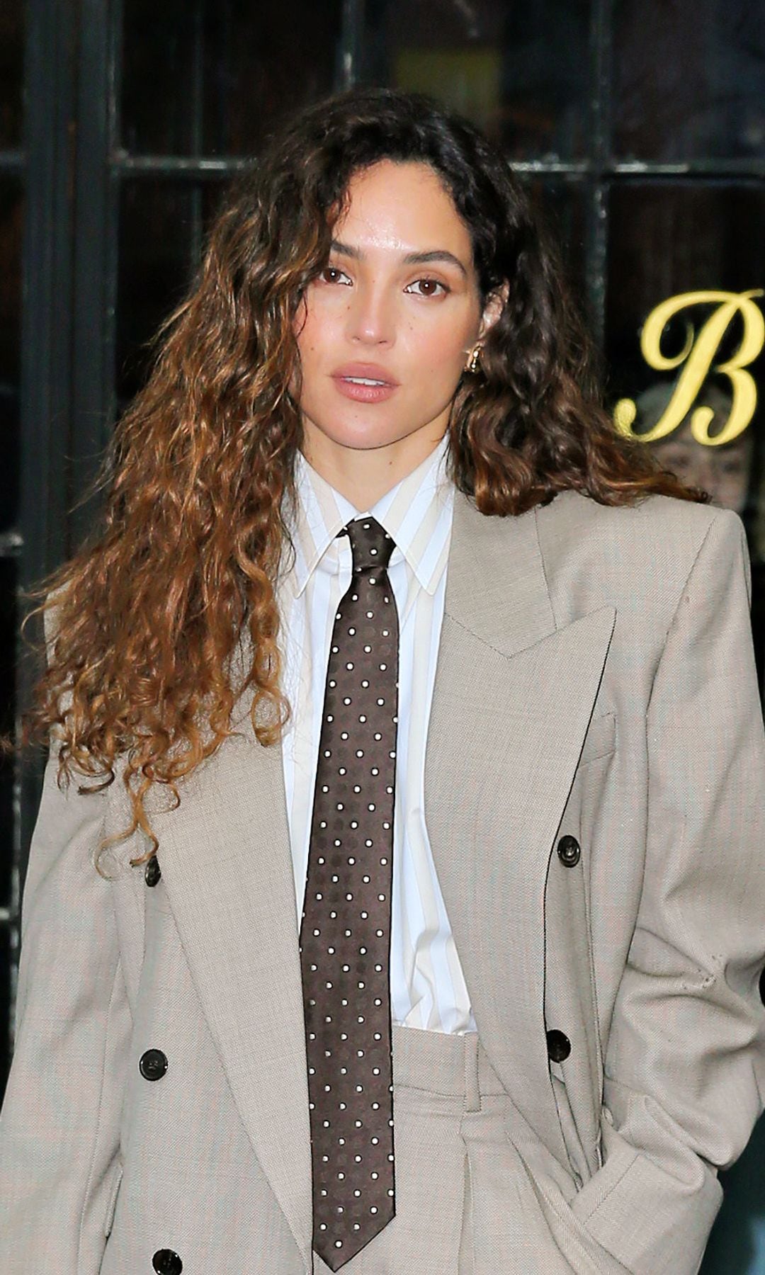 Adria Arjona turns heads with sexy twist on oversized suit in latest NYC outing