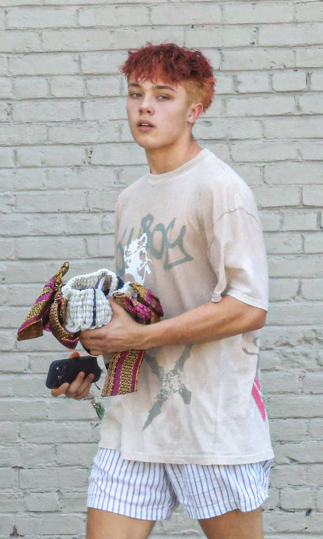 Angelina Jolie’s 18-year-old son was photographed returning home after his Friday Muay Thai class in Los Angeles on August 21.