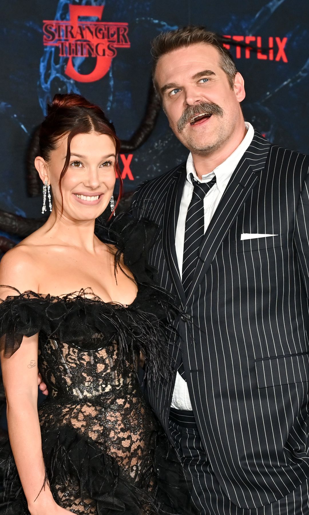 Millie Bobby Brown and David Harbour at the "Stranger Things" Season 5 World Premiere held at the TCL Chinese Theatre on November 06, 2025 in Los Angeles, California. (Photo by Michael Buckner/Variety via Getty Images)