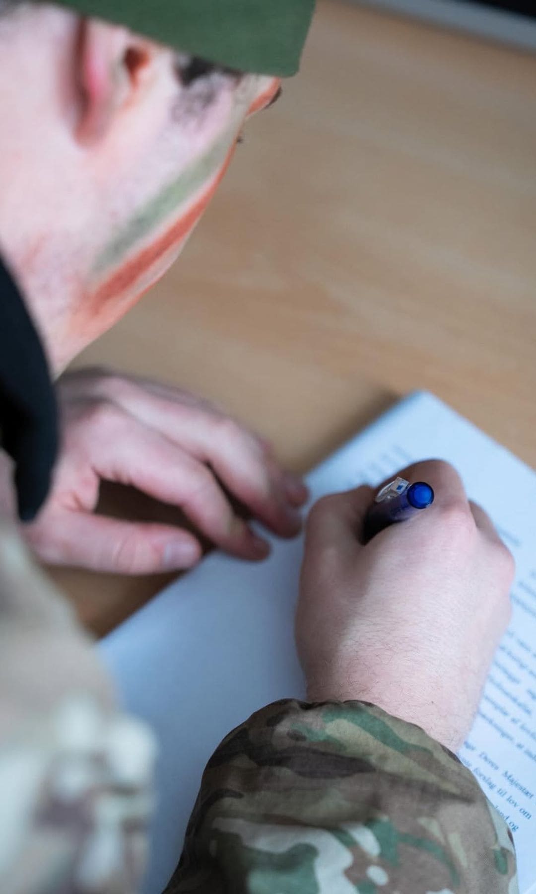 In photos shared by the Danish Royal House, Prince Christian was seen signing official documents