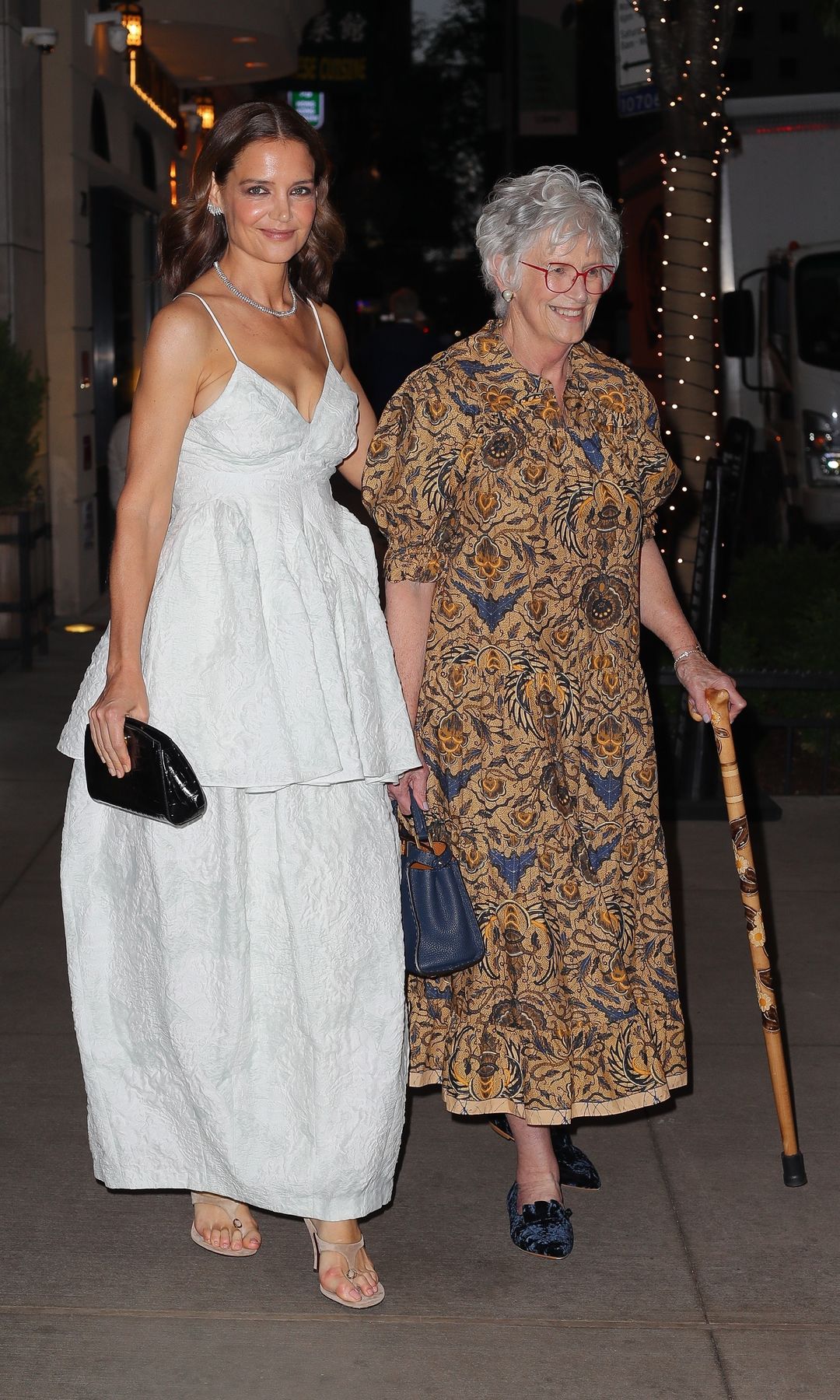 Katie and her mother wore elegant dresses for the gala