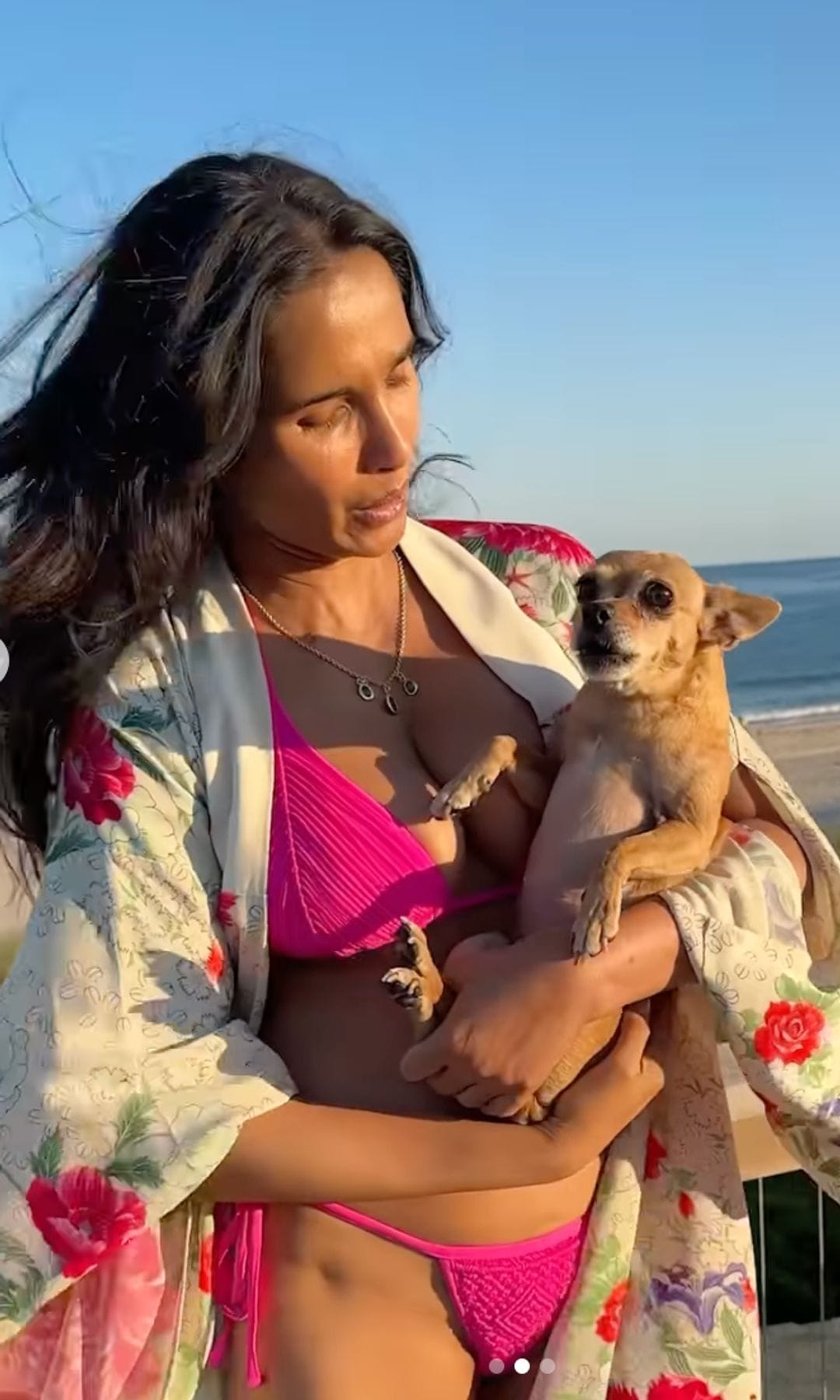 Padma Lakshmi in hot pink bikini with her dog Divina