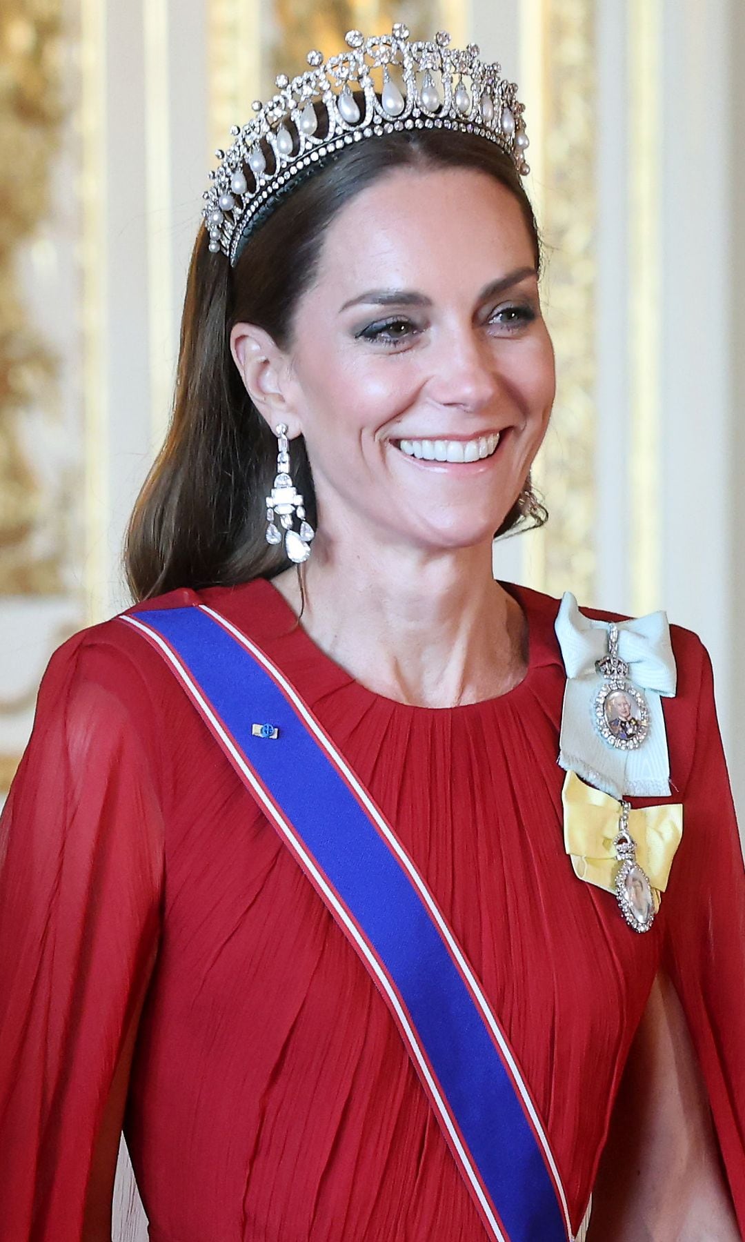 The Princess of Wales stuns for her first tiara appearance since 2023 wearing a gown by her wedding dress designer