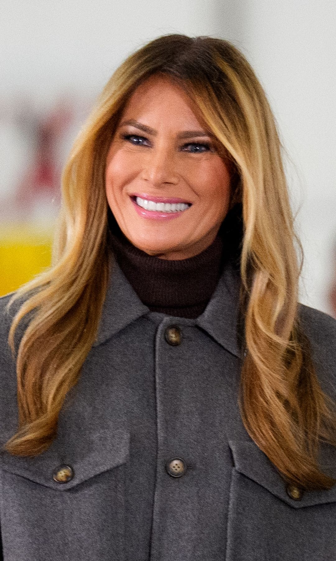 Melania Trump is all smiles in red carpet gown and cozy winter outfit during busy Washington weekend