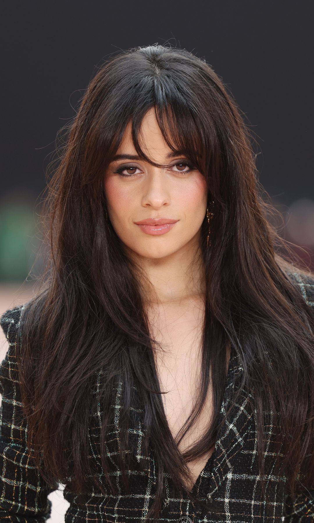 Camila Cabello steps out in figure-hugging minidress and knee-high boots in LA