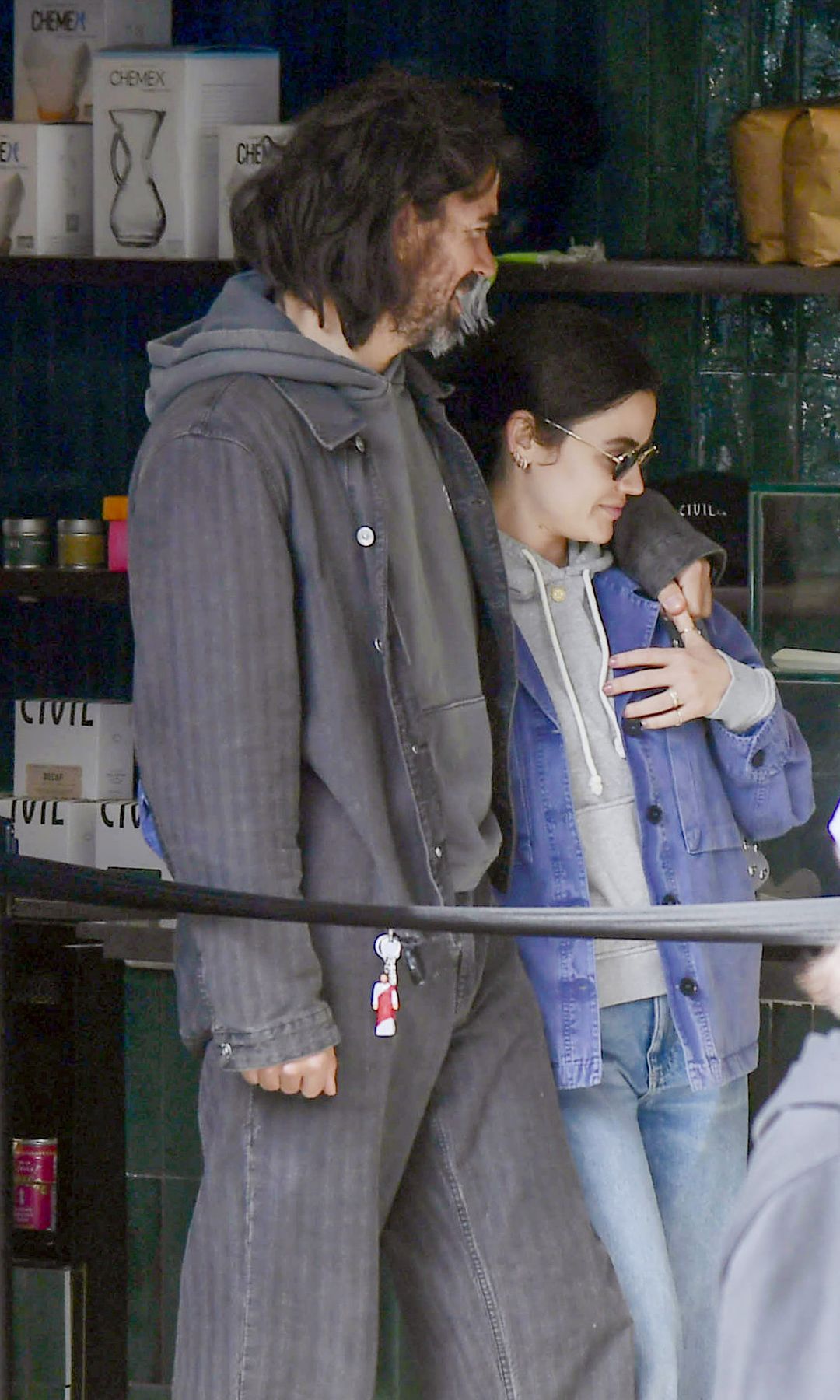 Lucy Hale and Phillip Lopez were seen on a coffee run in Los Angeles. Fans quickly spotted a ring.