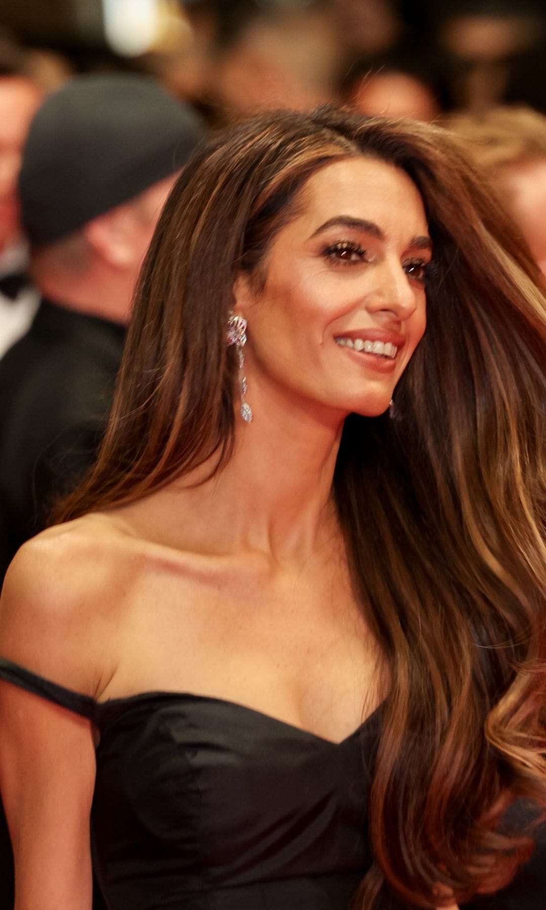 Amal Clooney posed in gold corset dress with Karlie Kloss during special event