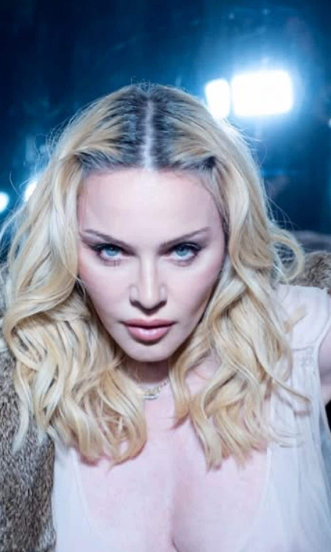 Madonna looks ageless at 67 posing in satin corset and platform heels ahead of 2026 music comeback