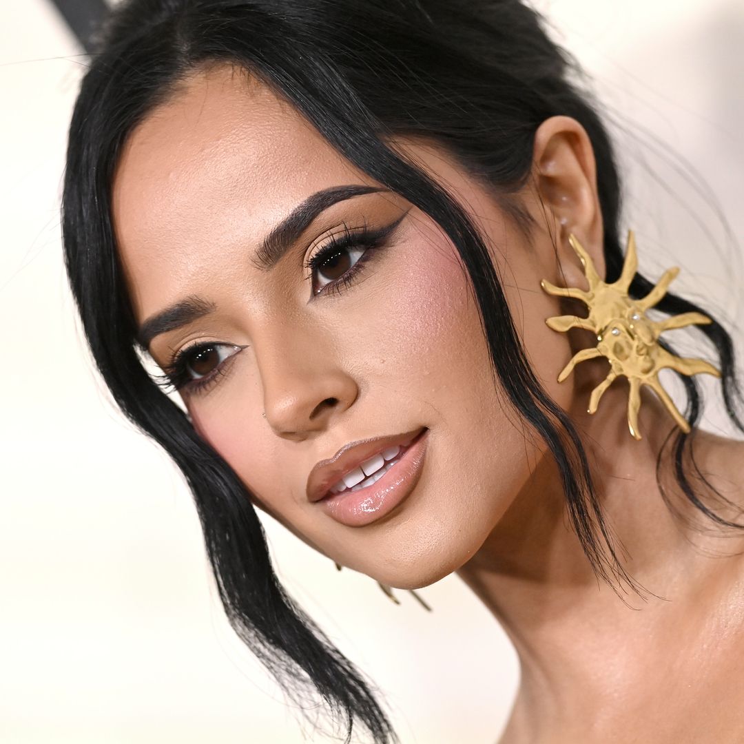 Becky G looks like a goddess in sultry gown and gold sandals
