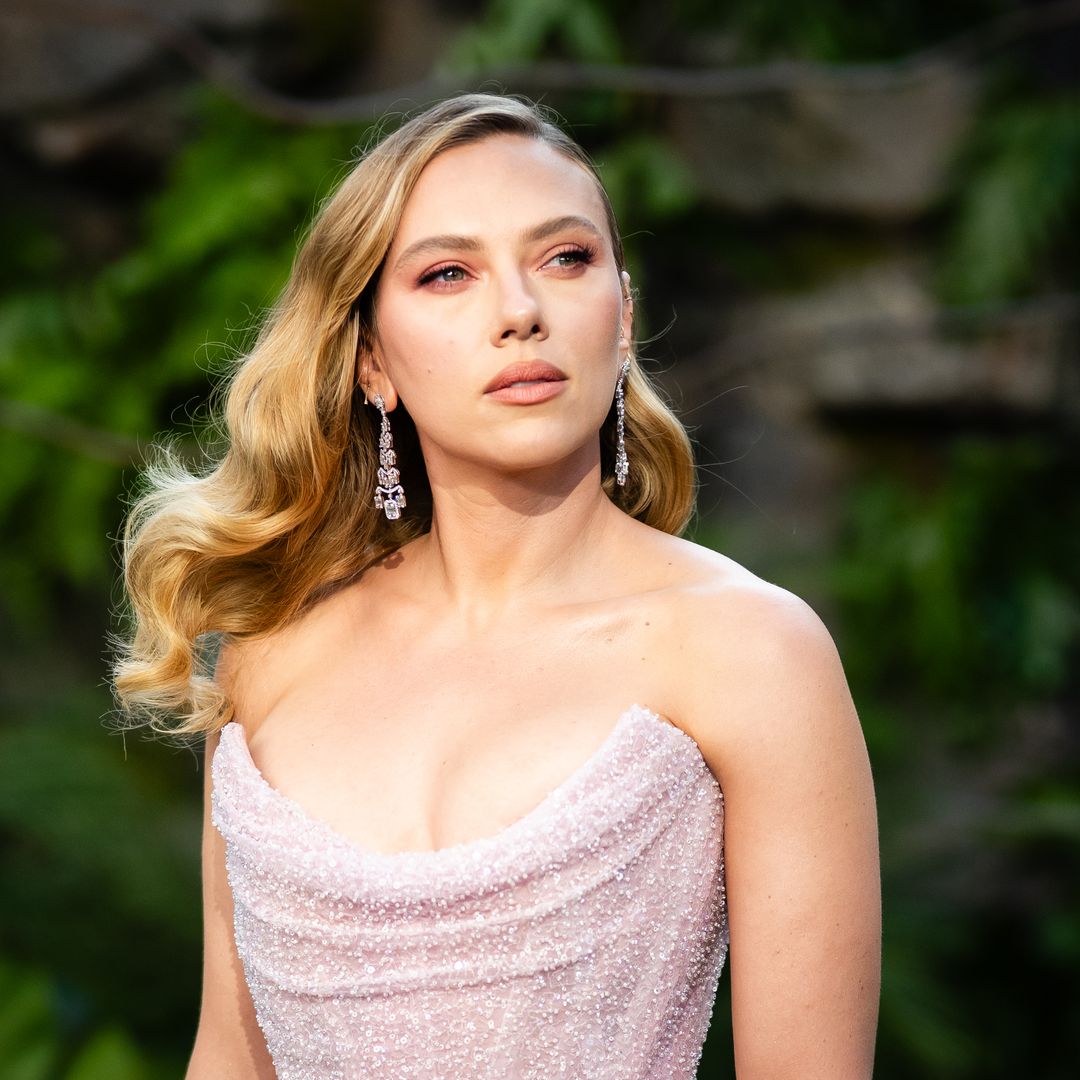 Scarlett Johansson poses in figure-hugging red dress and diamond choker in Shanghai: Her latest fashion moments
