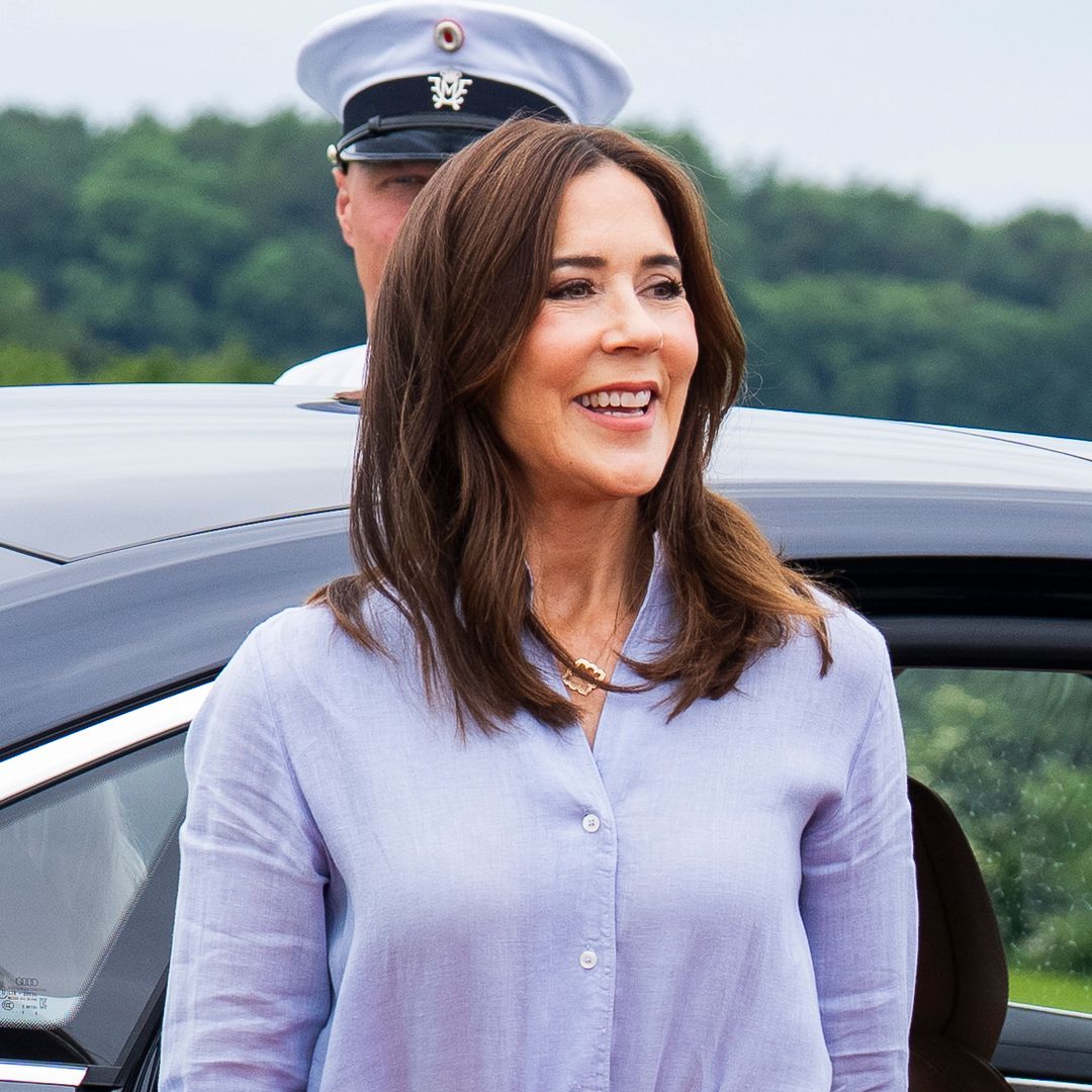 Queen Mary steps out in a soft pink ensemble with the chic hairstyle royal fans love