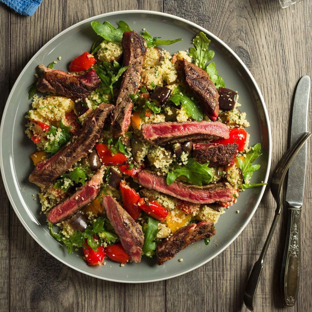 Home made freshness roasted vegetable couscous salad with char-grilled rare ribeye steak 