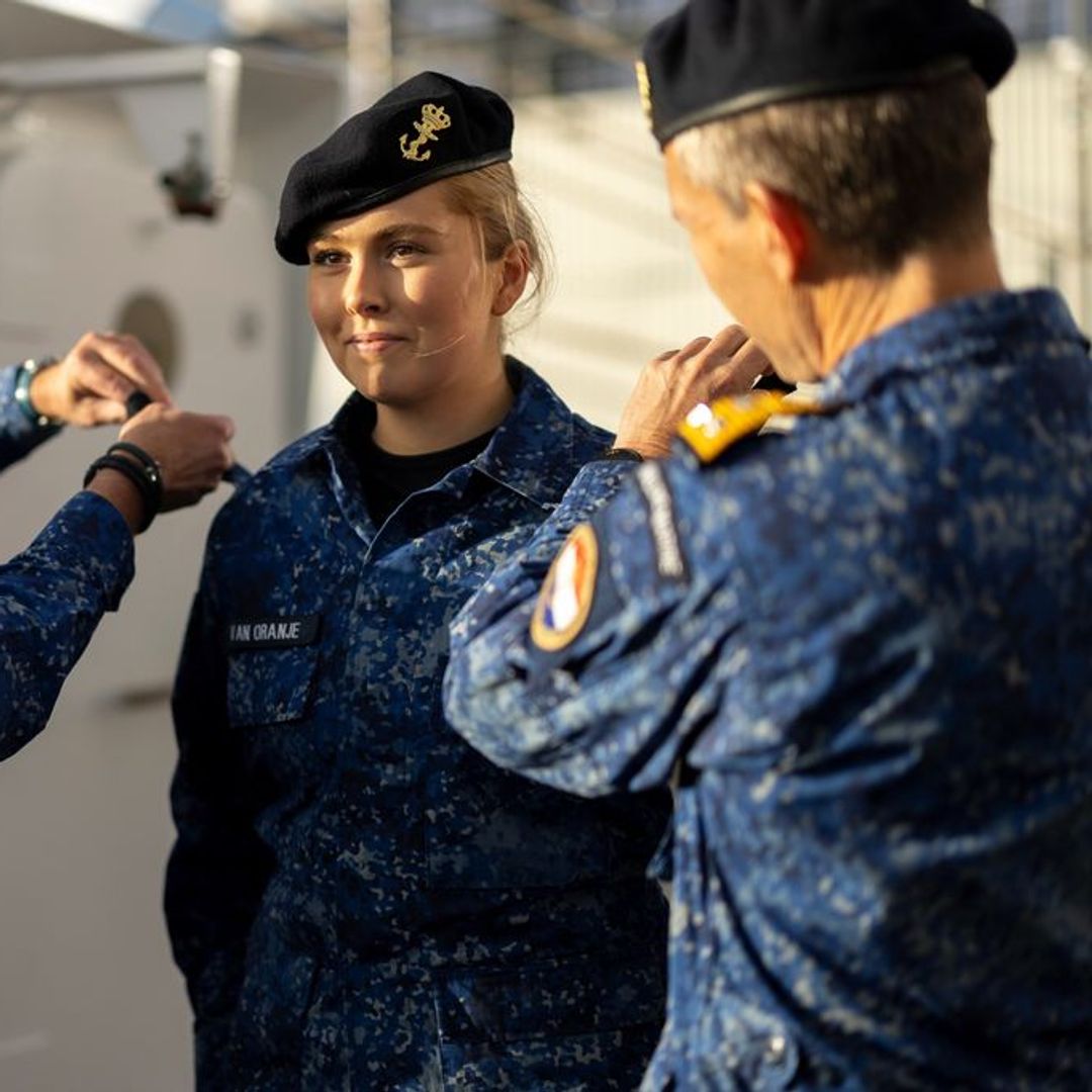 Princess Amalia gets soaked on deck as she earns a new rank in the Dutch navy