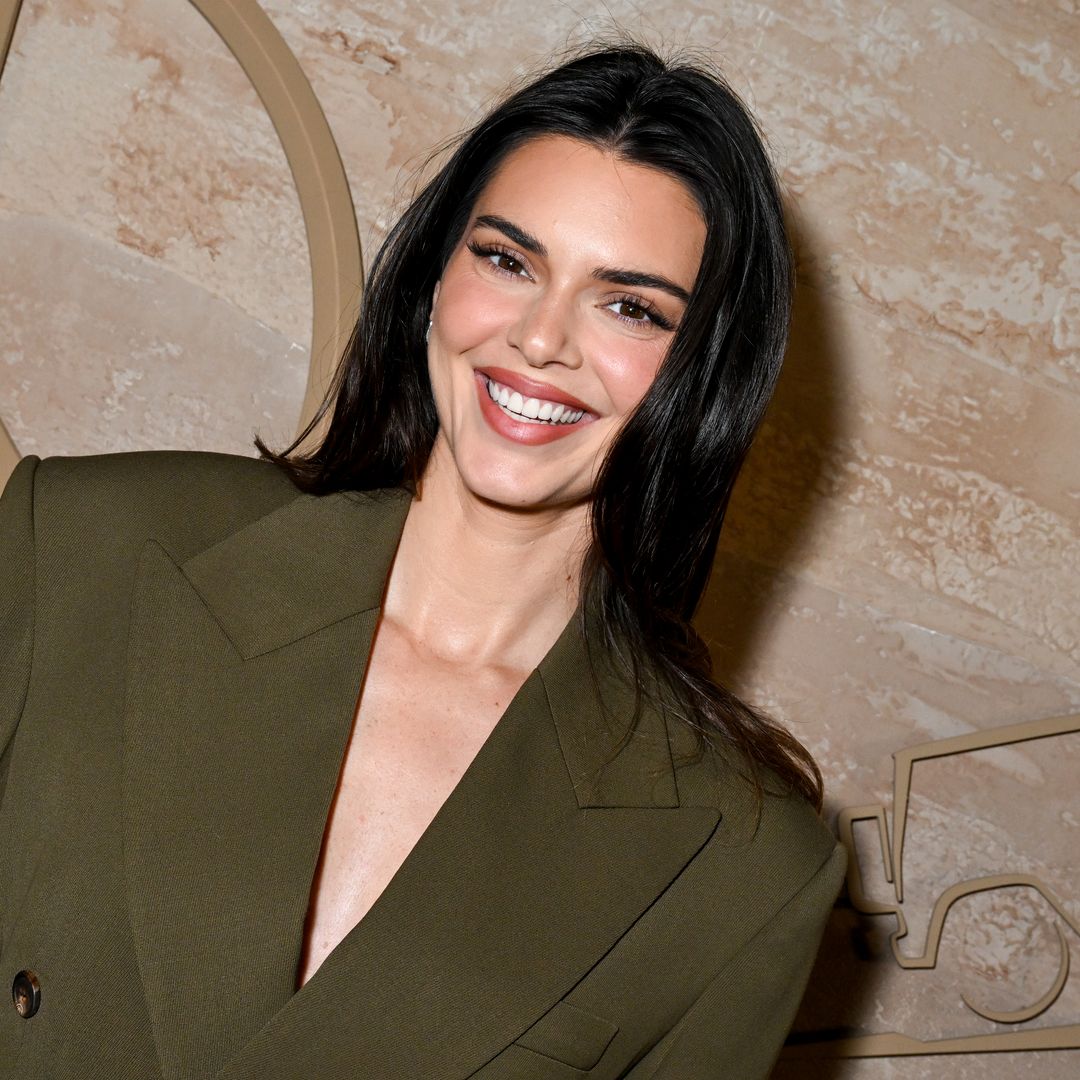 Kendall Jenner steps out in micro shorts and a crop top paired with the latest sneaker trend