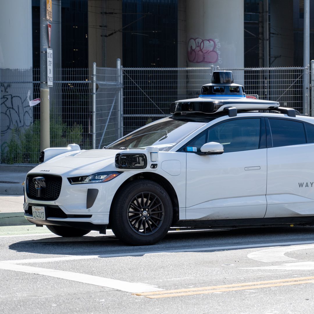 The internet erupts after a viral video shows a Waymo driving through a police standoff in Los Angeles