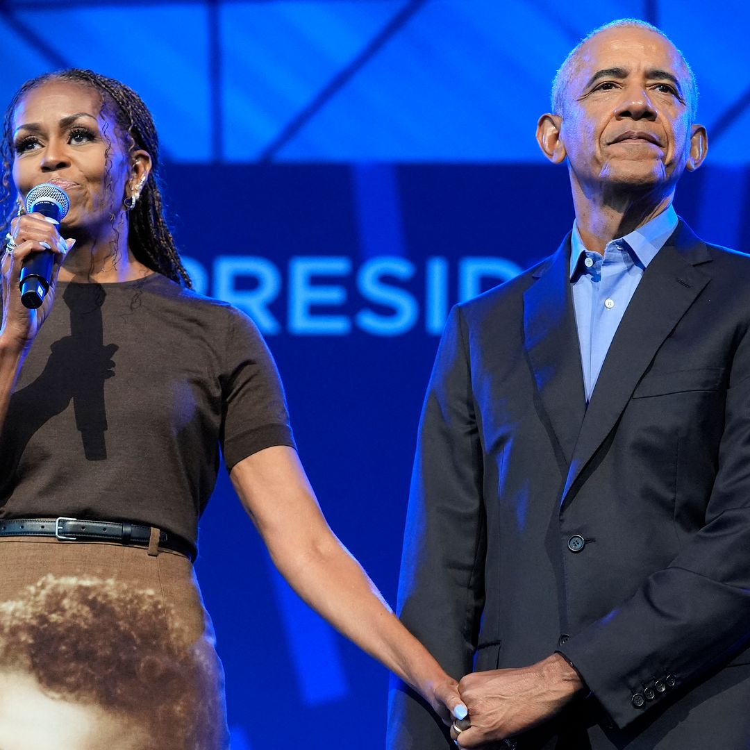 Michelle and Barack Obama tear up onstage at the opening of the Obama Presidential Center