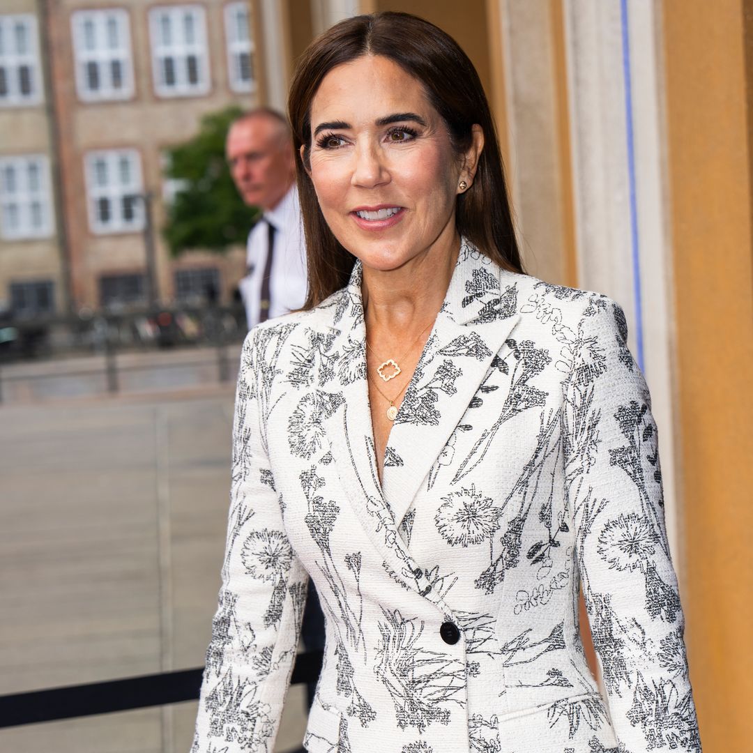 Queen Mary turns heads in a chic embroidered suit at Copenhagen exhibition
