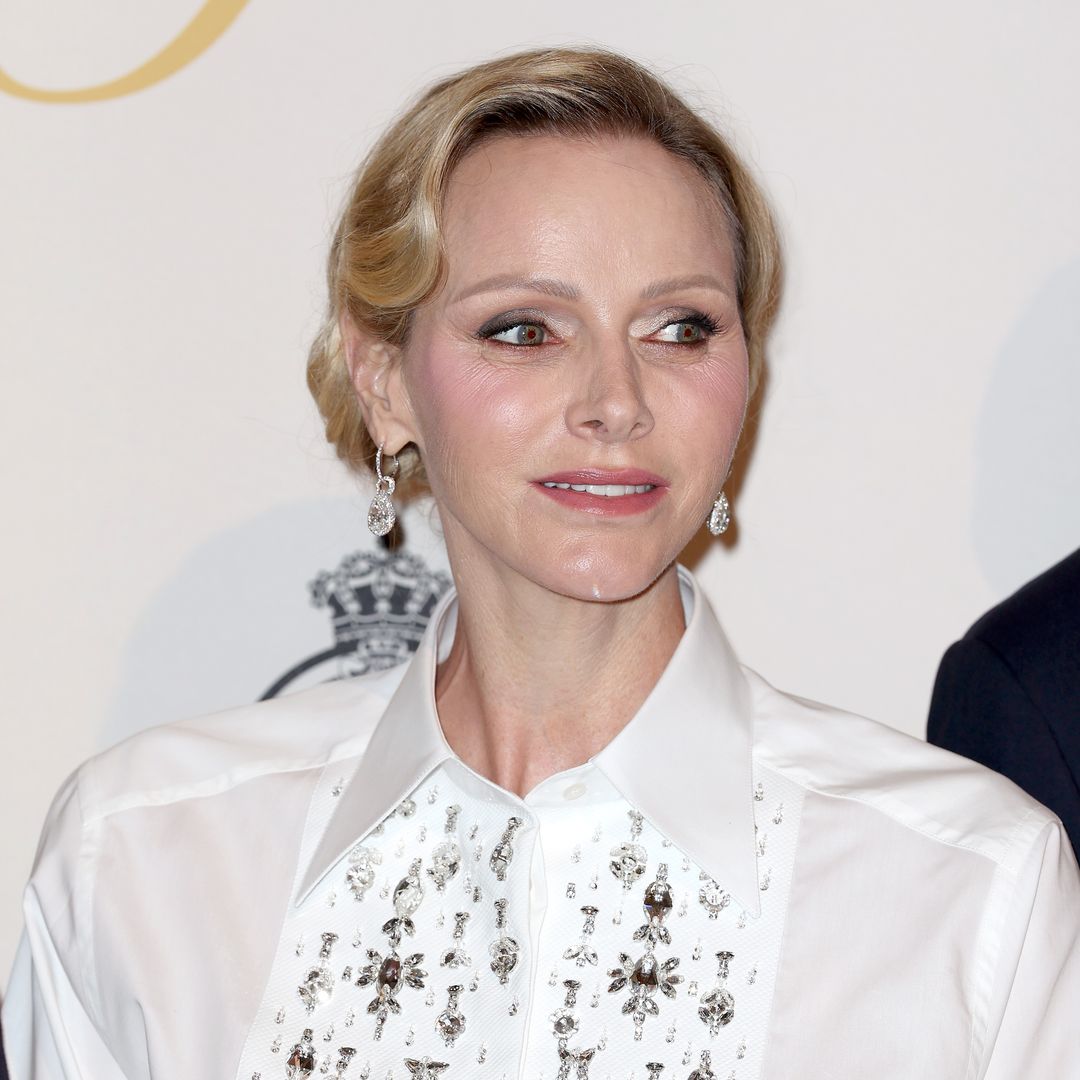 Princess Charlene revives Queen Rania’s iconic white shirt and long skirt look at Formula 1 gala