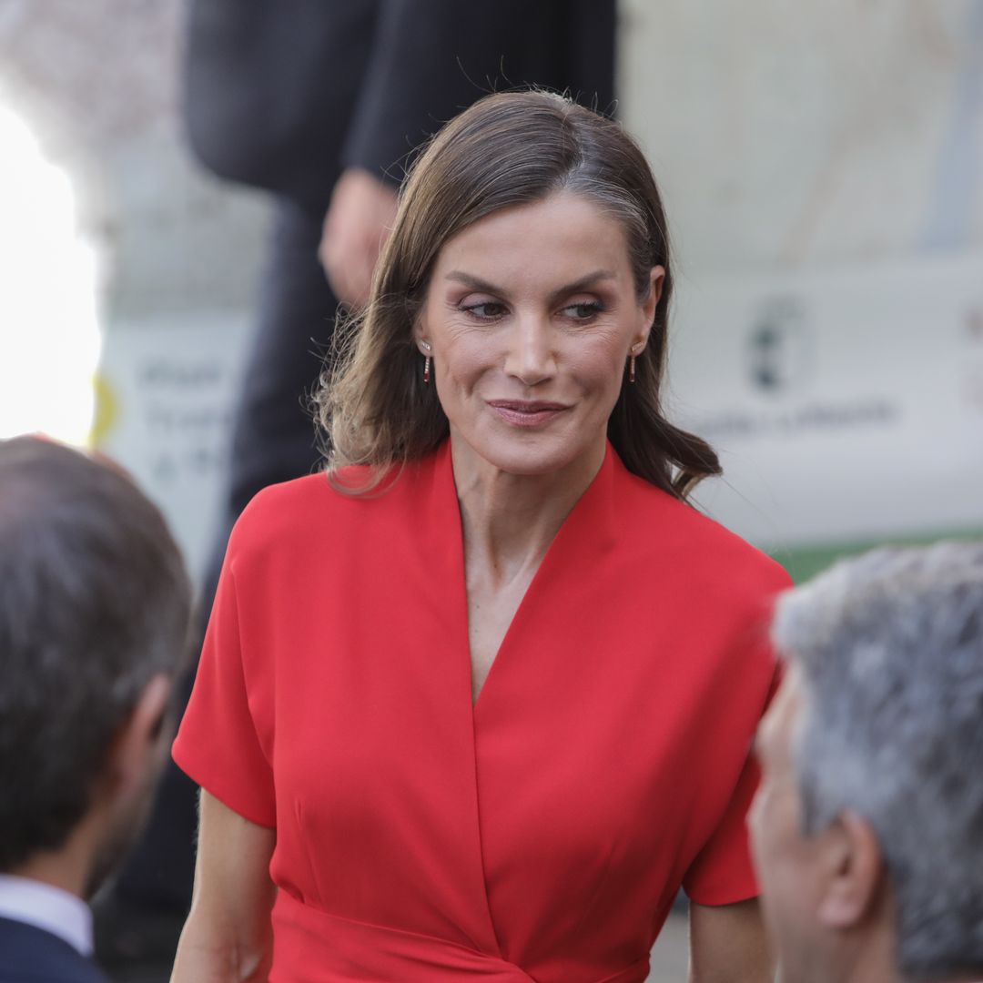 The ‘Letizia red’ is back! Spain’s Queen debuts oriental-neckline dress projecting confidence and power