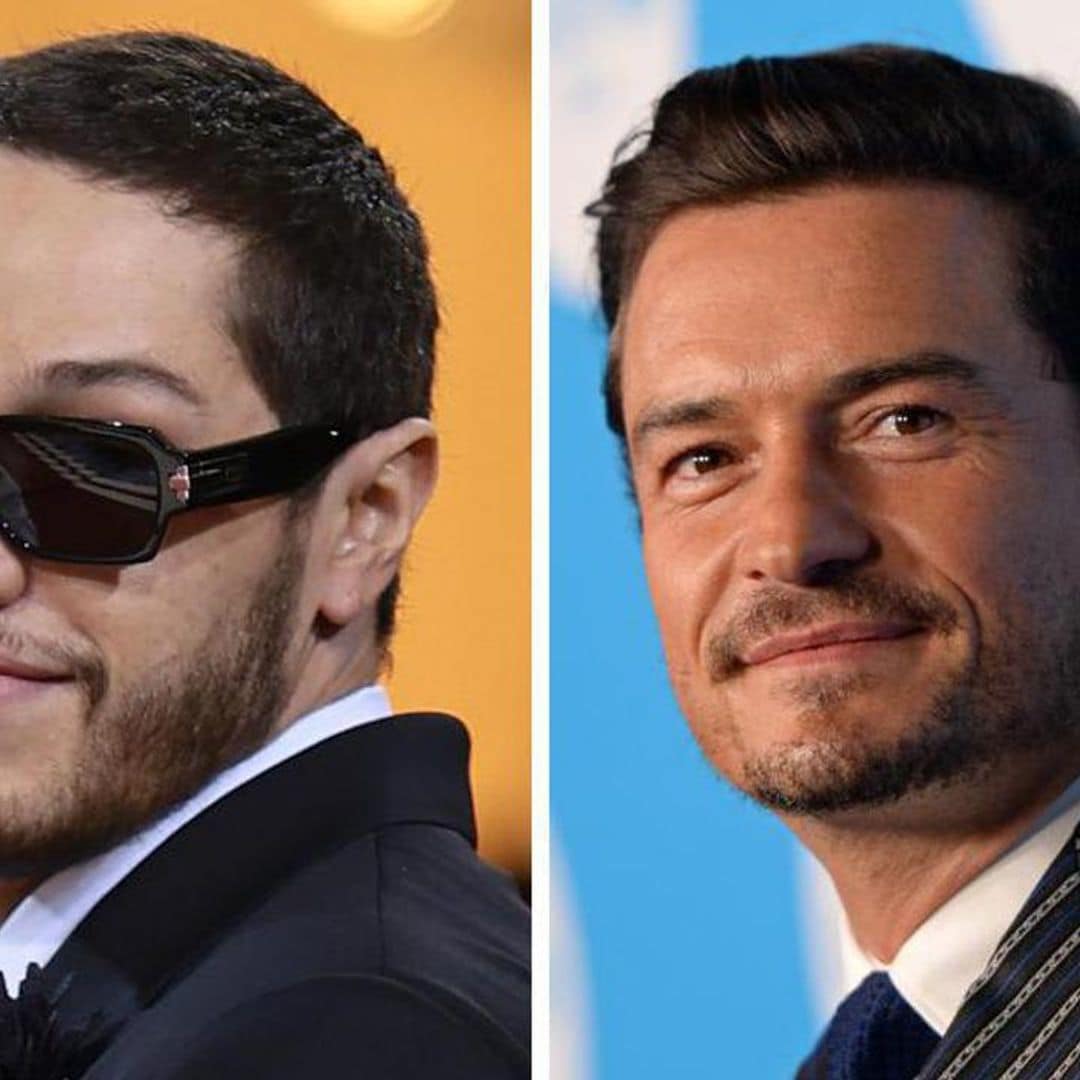 Pete Davidson talks to a shirtless and ripped Orlando Bloom on set in Australia