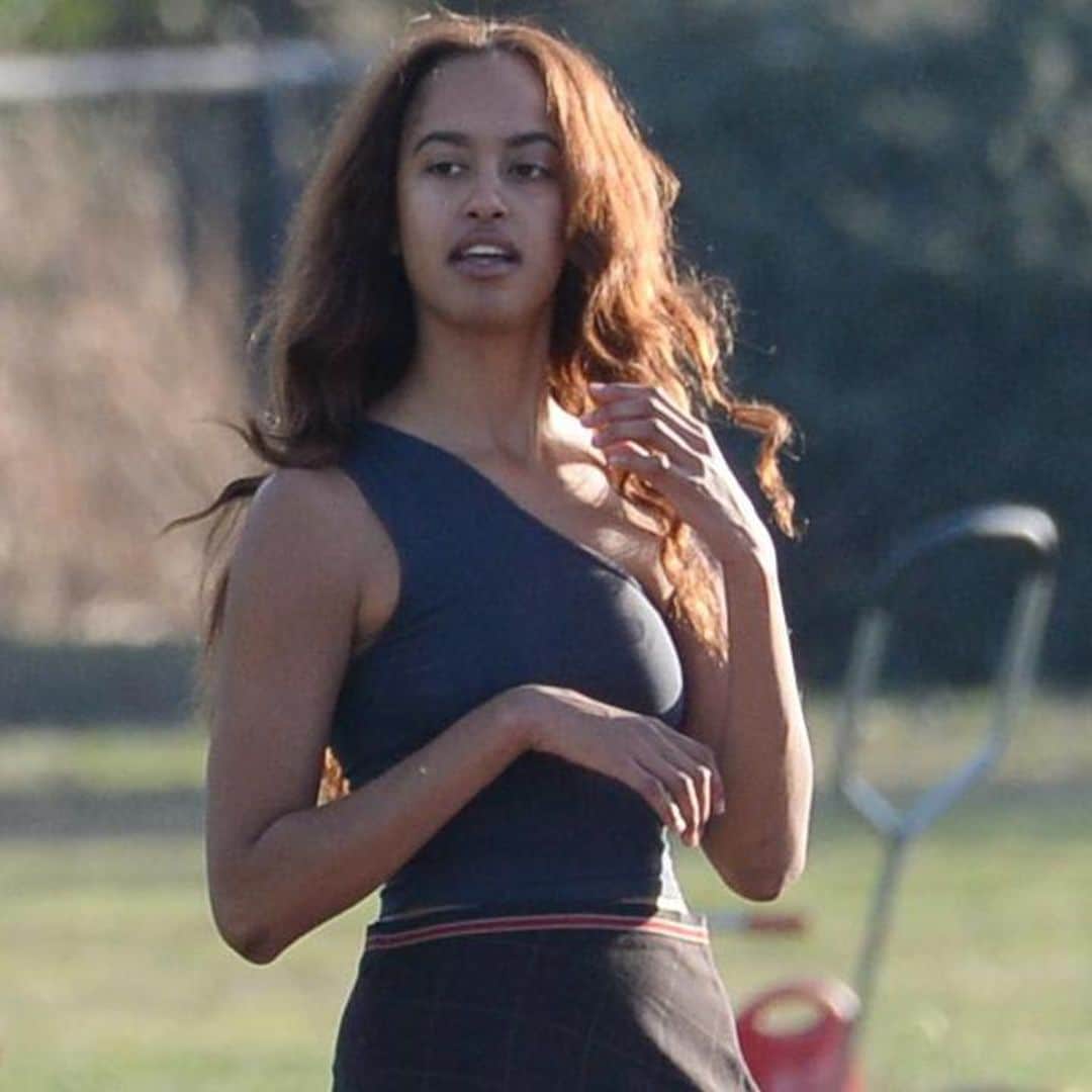 Malia Obama’s chic fall outfit includes high slit skirt and leather boots