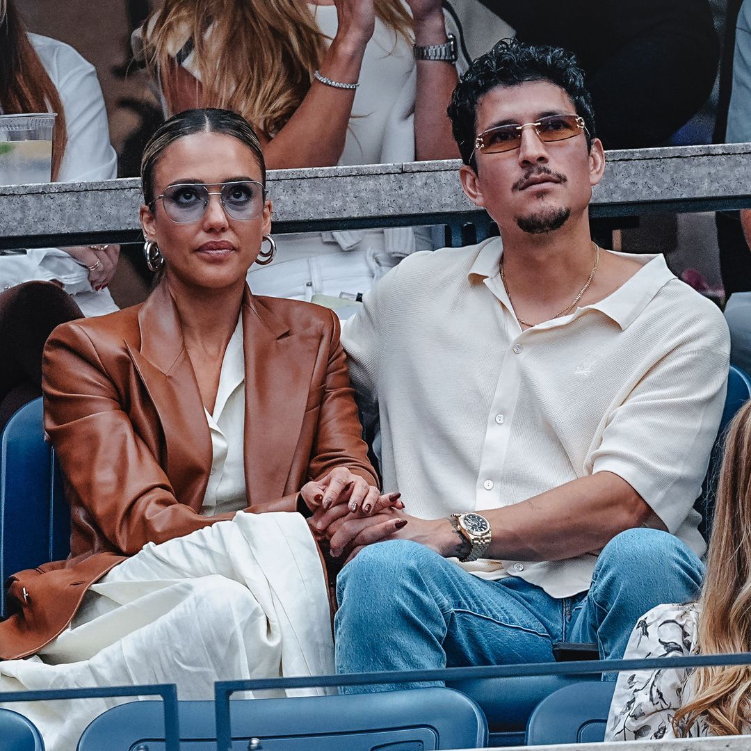 Jessica Alba and Danny Ramirez can't get their hands off each other at the U.S. Open