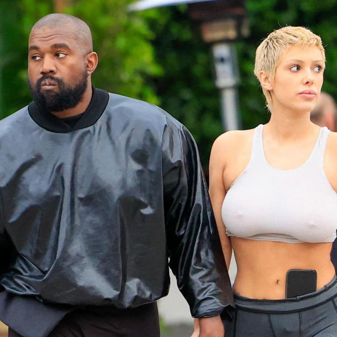 Bianca Censori poses for Kanye West in black micro bikini and leather corset