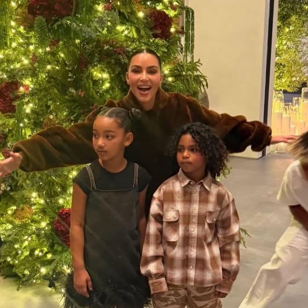 Kim Kardashian hilariously fails to wrangle all four of her kids for a holiday photo: "I tried"