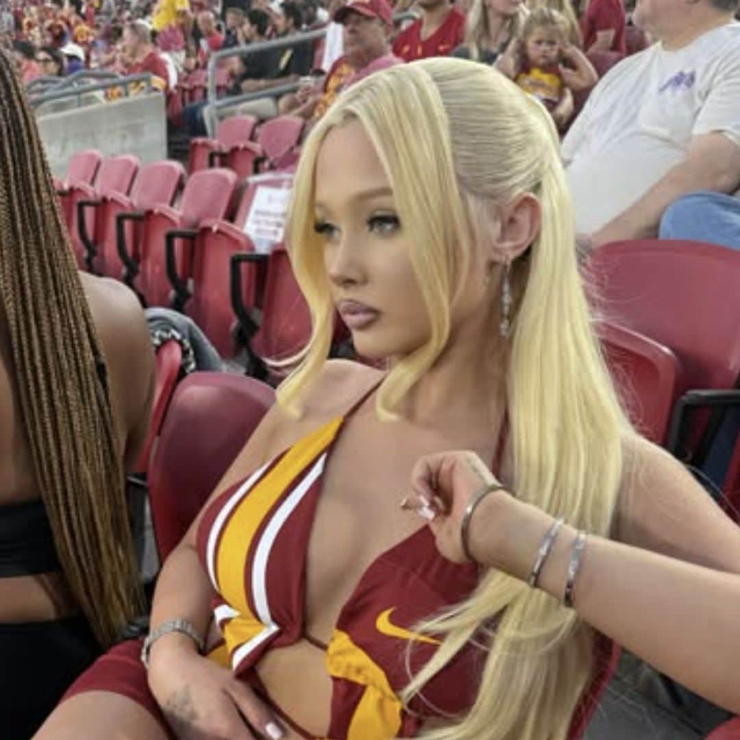 Alabama Barker turns heads with sultry football game photos