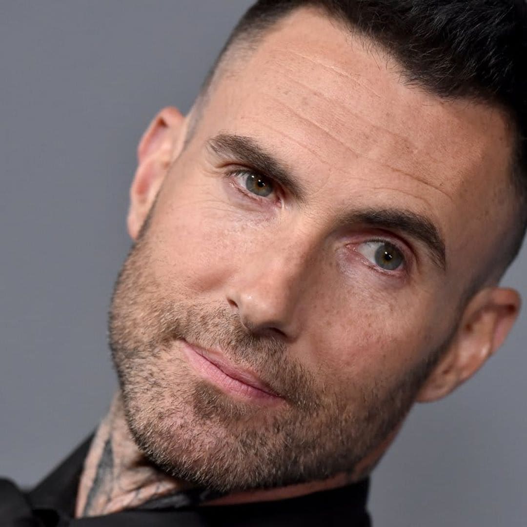 Adam Levine debuts brand new face tattoo--check out his new look!