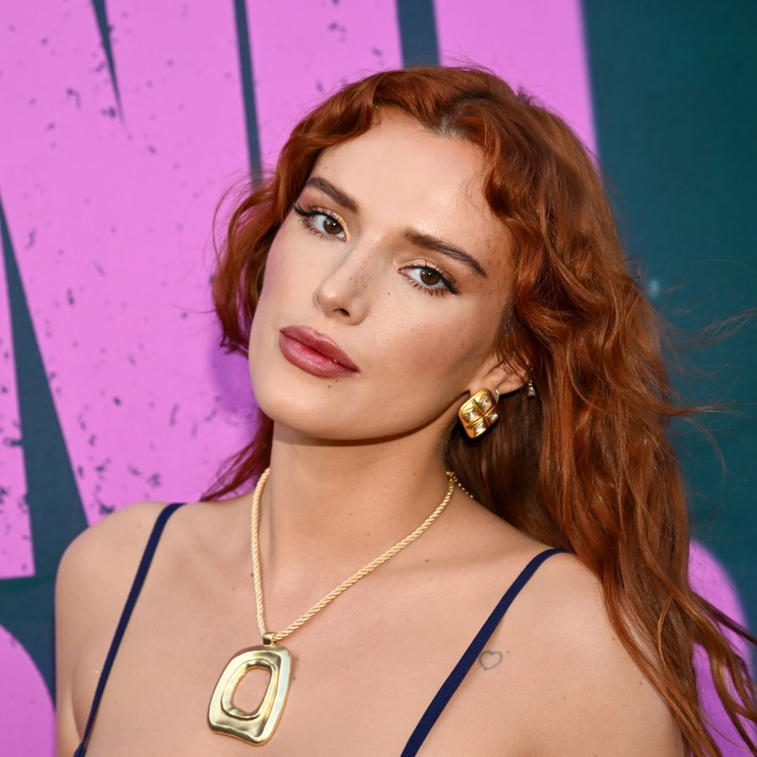 Bella Thorne shows off shimmering green bikini during romantic beach day with fiancé Mark Emms