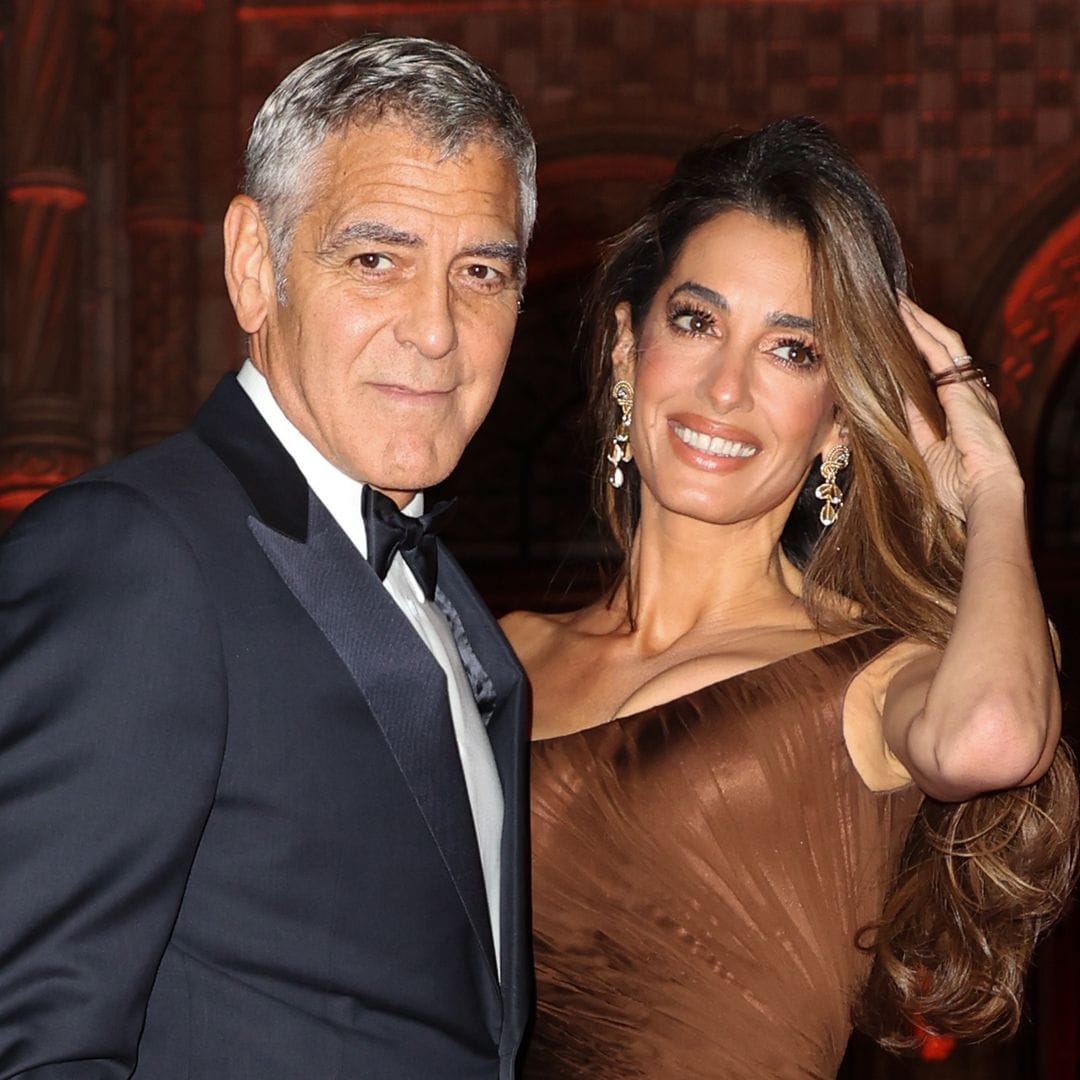 Amal Clooney’s hot pink minidress and gold pointed-toe heels are the perfect party look
