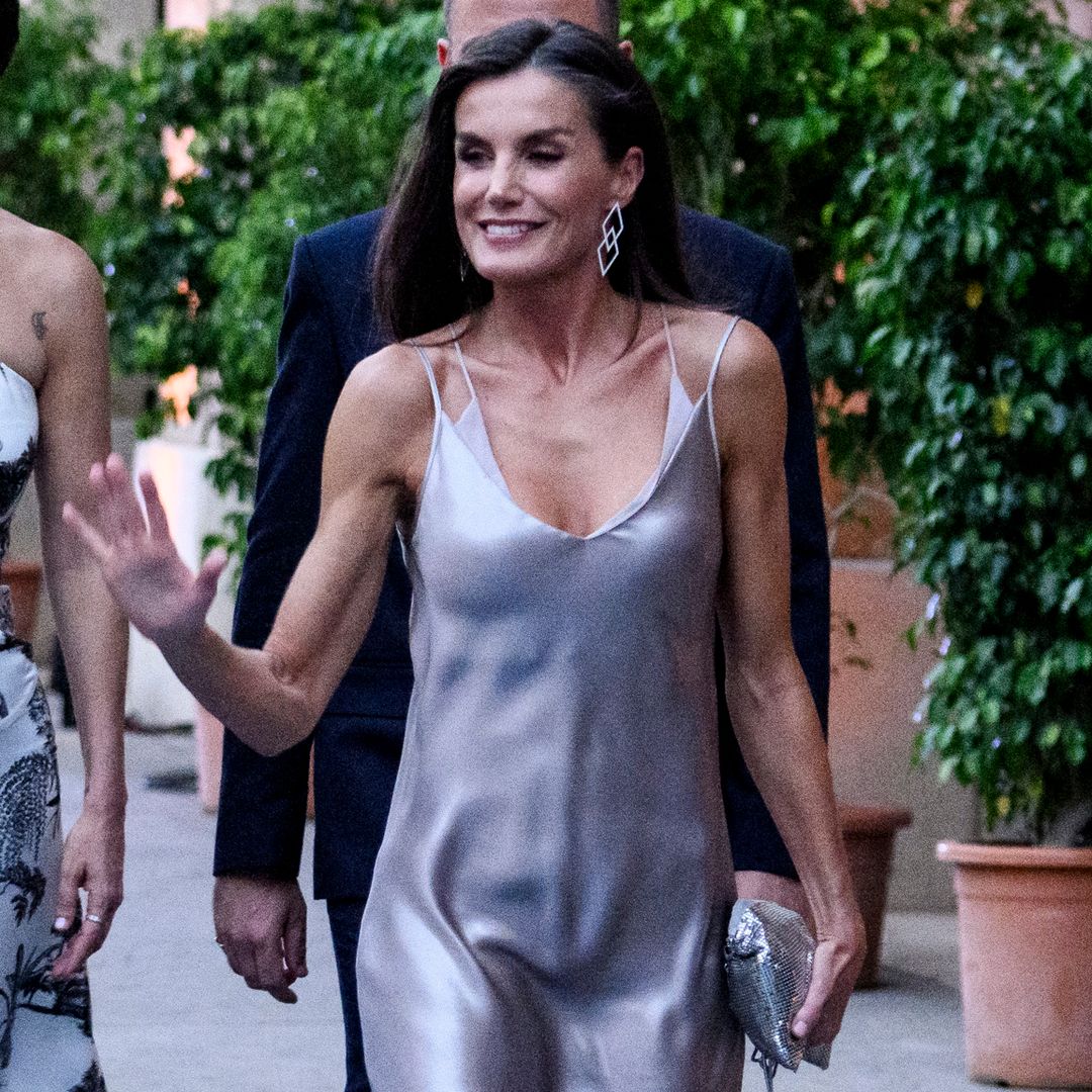 Queen Letizia of Spain wows in metallic liquid dress