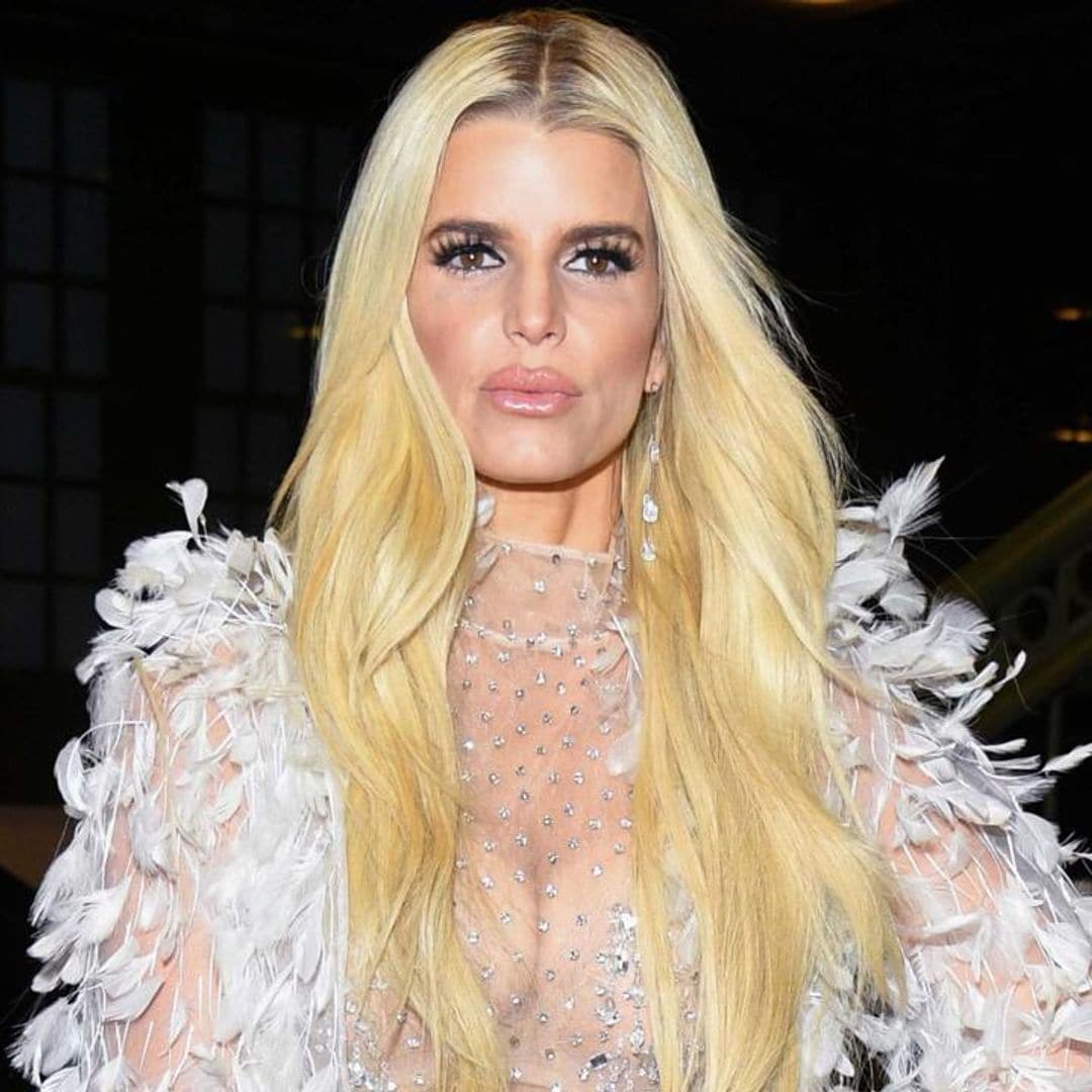 Jessica Simpson turns up the heat in animal print bikini and gold platform heels