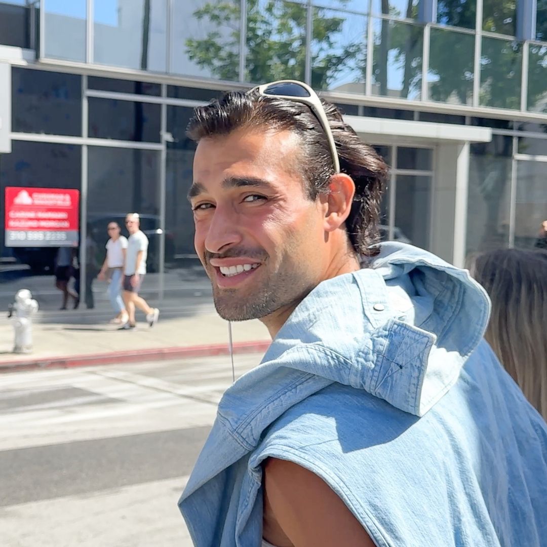 Britney Spears’ ex, Sam Asghari, gets touchy while walking around with new girlfriend in coordinated athleisure