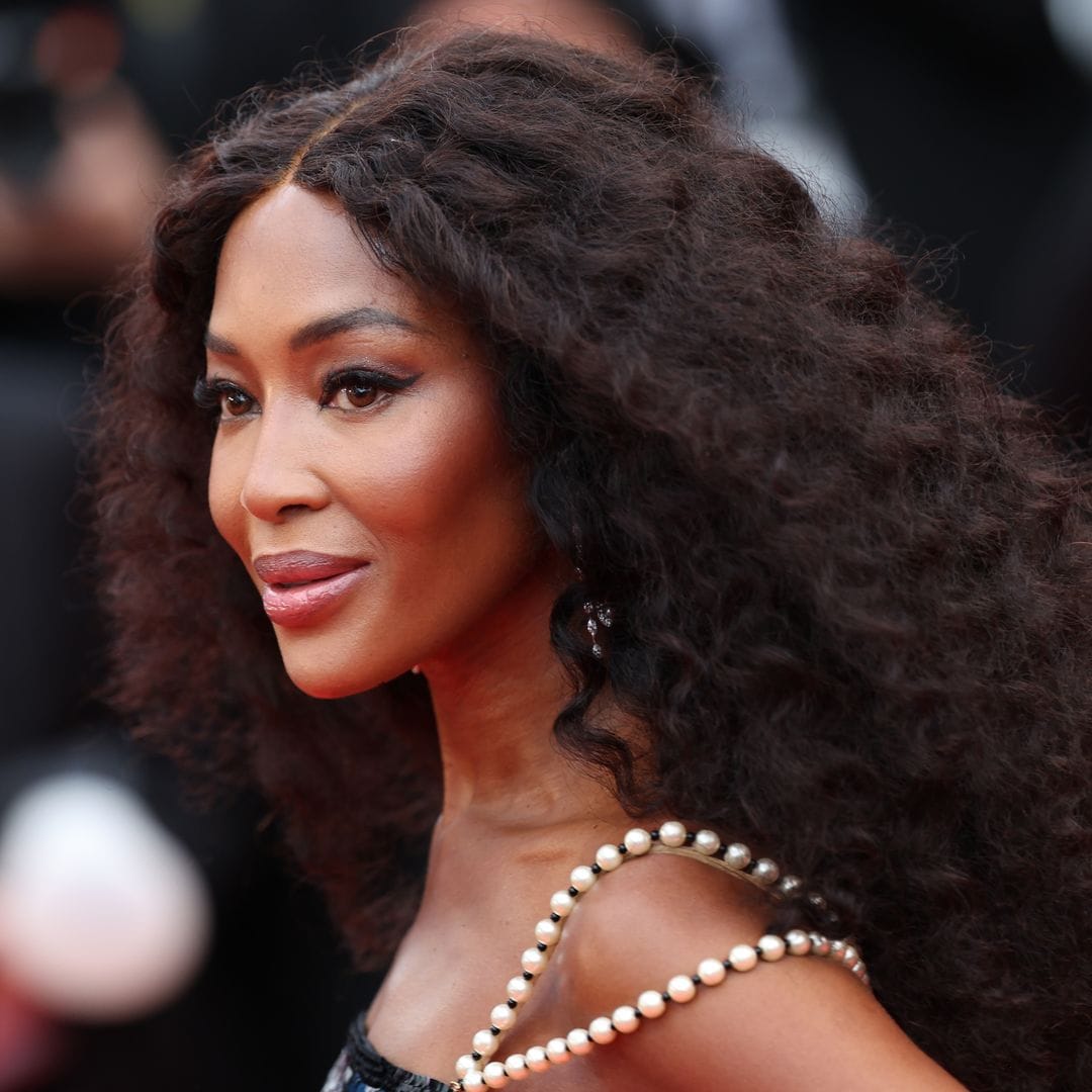 Naomi Campbell, 55, turns up the heat in Ibiza in pink string bikini and statement jewelry