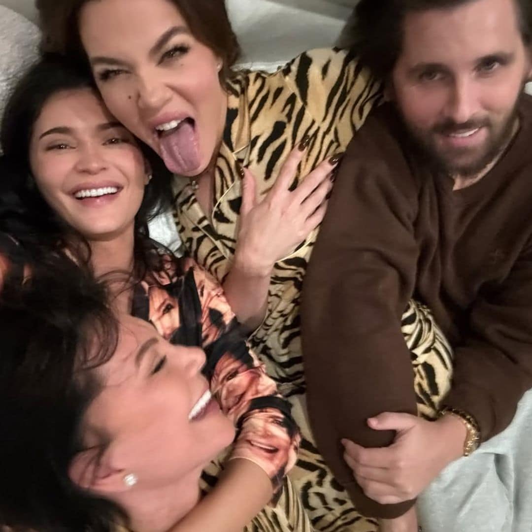 Khloe Kardashian and Scott Disick cuddle in bed for a "family sleepover"
